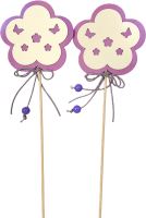 Flower with a bead on a stick